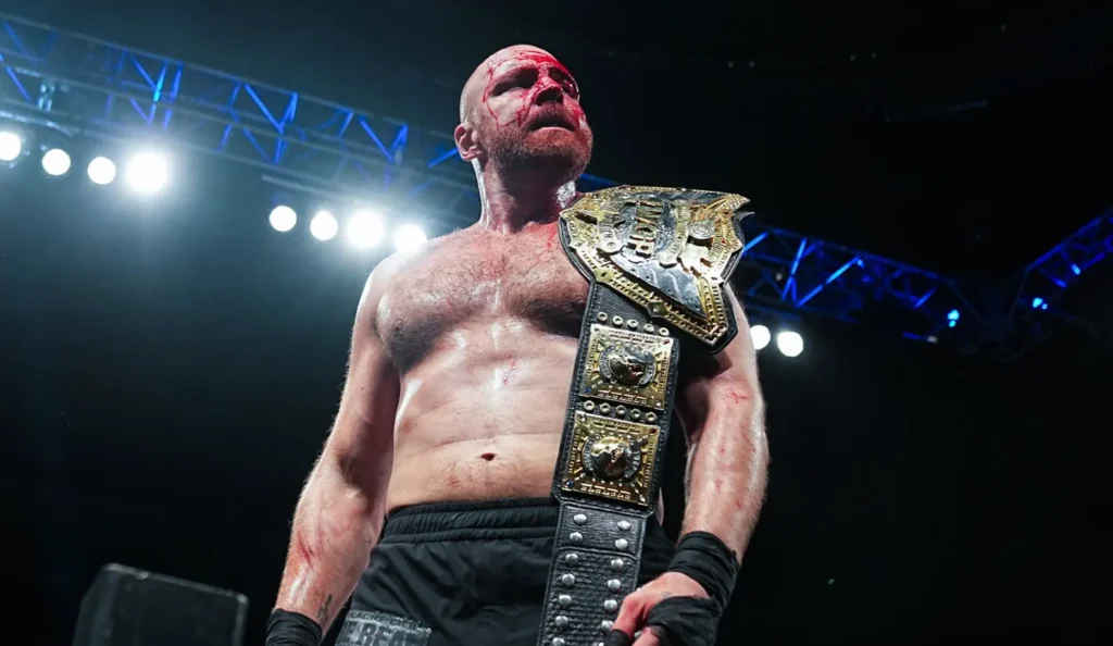 Jon Moxley with IWGP World Heavywieght Championship